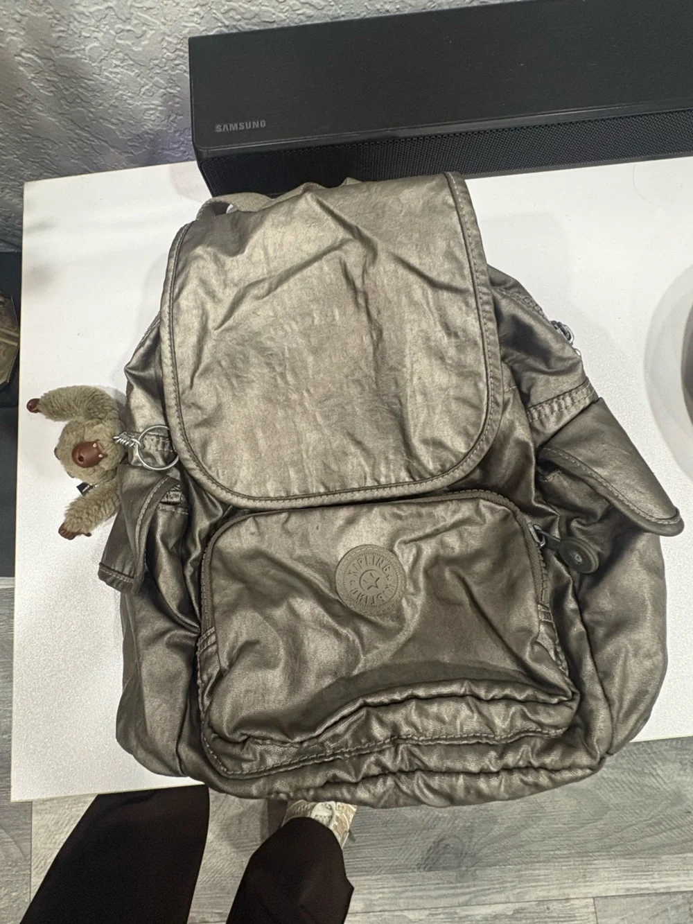 Kipling Metallic Silver Nylon Backpack with Monkey Charm